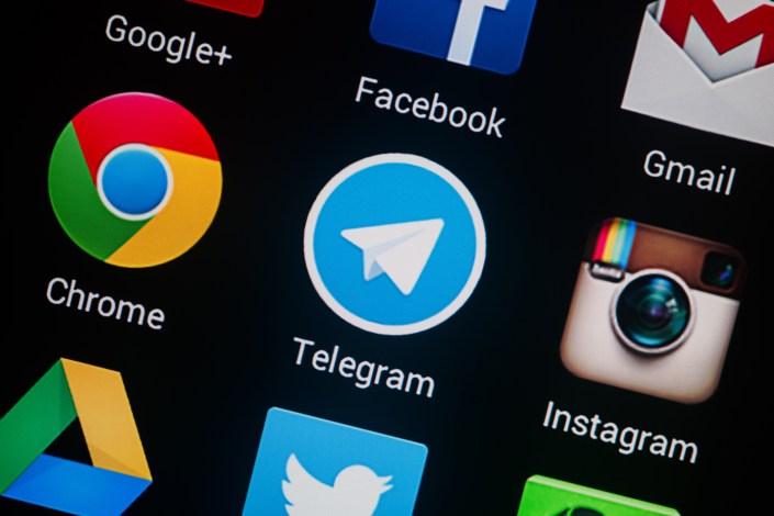 NOVOKUZNETS, RUSSIA - MARCH 13, 2014: Closeup photo of Telegram icon on mobile phone screen.; Shutterstock ID 181909403; PO: aol; Job: production; Client: drone